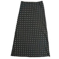 Black Aeropostale women's polka dot maxi slip skirt with a flowy silhouette and elastic waistband, ideal for casual or dressy wear.