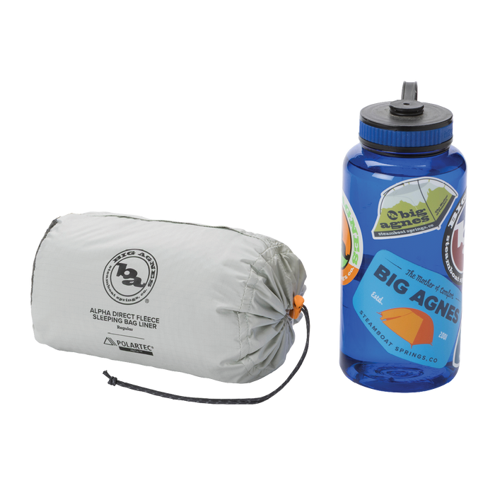 Sleeping bag liner and water bottle with Big Agnes Returns branding on a white background