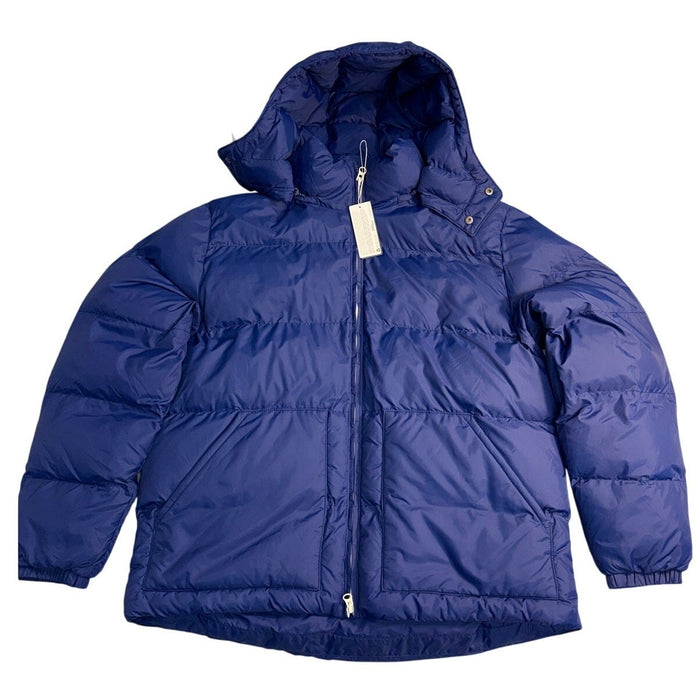 Men's Alpine Design 1962 insulated puffer jacket in space blue, featuring quilted design and front zipper closure.