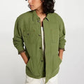 Alpine Design quilted lined chore coat in lush olive, showing the durable jacket with quilting details and front pockets.