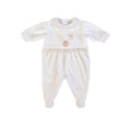 Baby onesie with white top and textured bottom on a white background