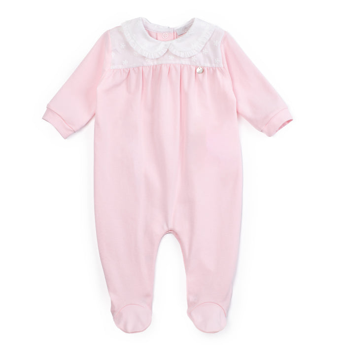 Pink baby onesie with a white collar on a white background