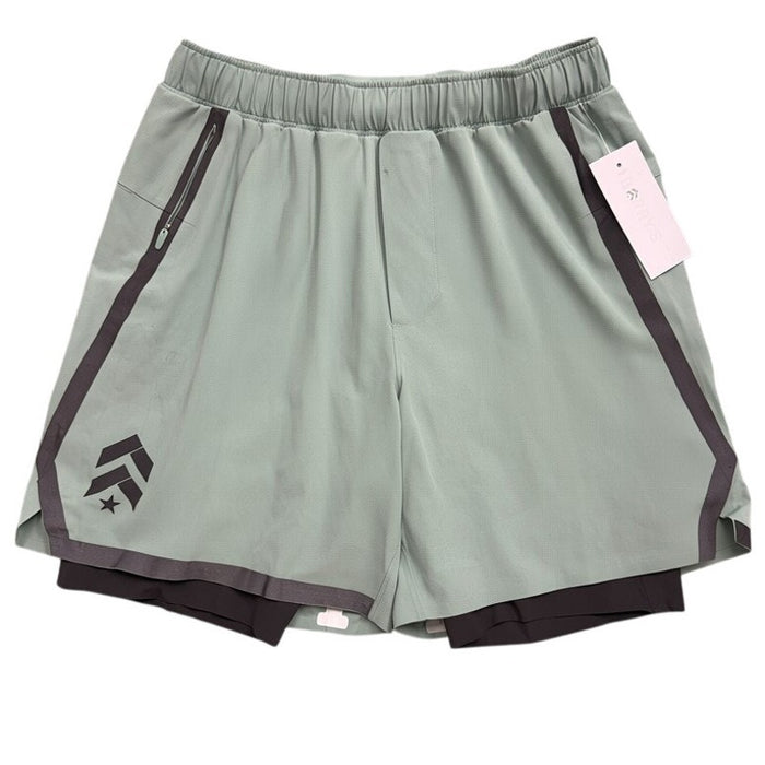 Green and black men's Lululemon Pace Breaker lined shorts with waistband drawstring and logo, size medium, new with tags.