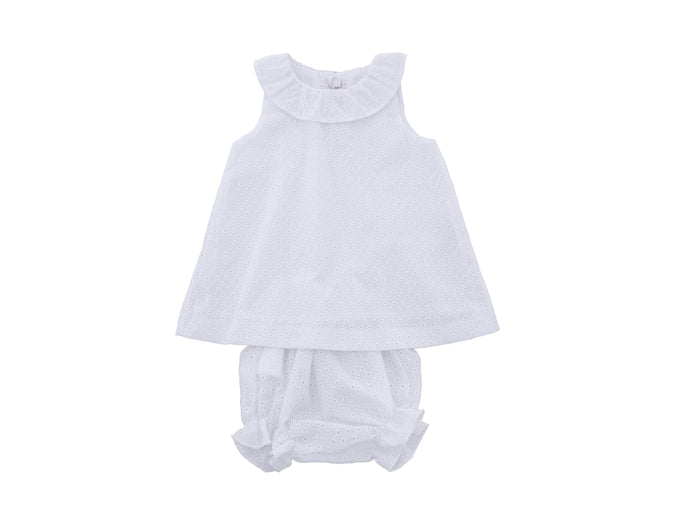 White baby dress and bloomers set on a white background