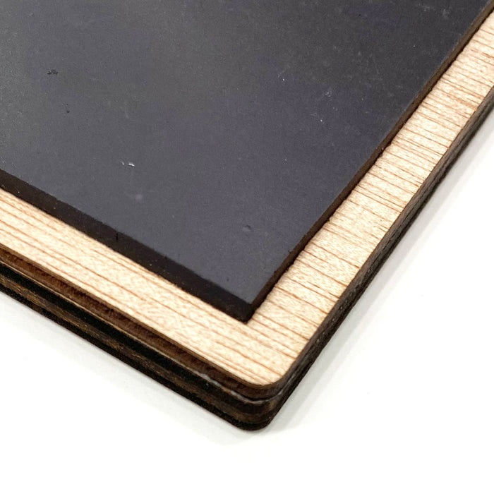 Close-up view of the back of a magnet.