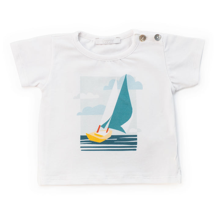 White t-shirt with a sailboat graphic on a white background