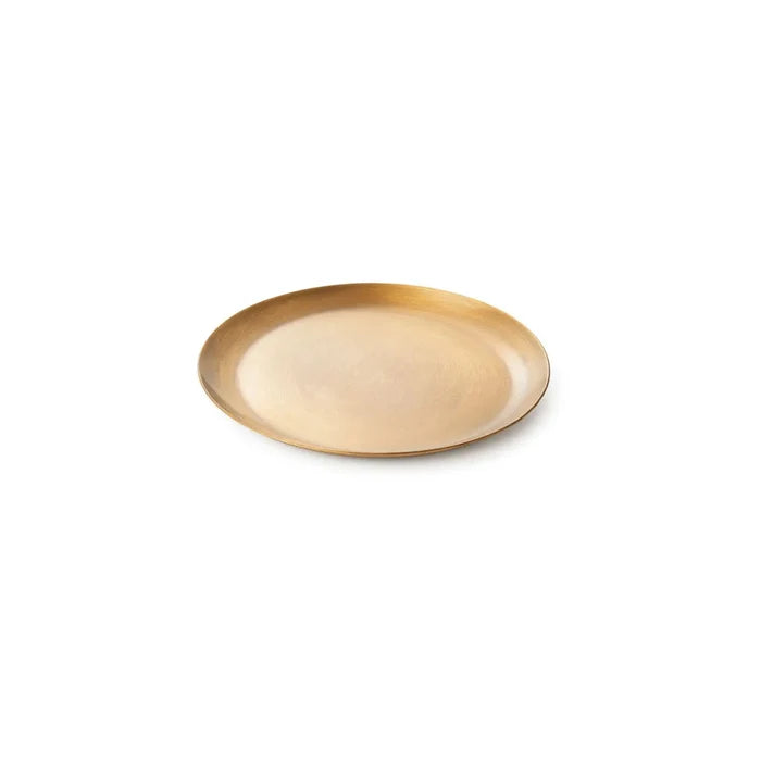 Round brass plate with shallow rim, polished metallic finish