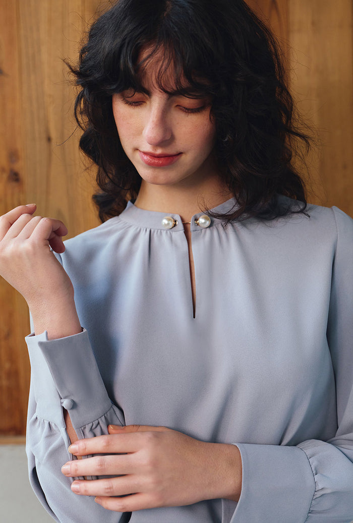 Petite Studio's Office-Appropriate Buvette Pearl Blouse in Dusty Blue