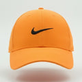 Nike Club Cap adjustable hat in neon orange (Papaya) with Nike logo, X/XL size, featuring a curved brim and breathable fabric.
