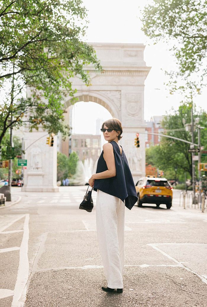 Petite Studio's Didi Cowl Neck Flared Top in Navy