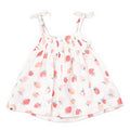 White dress with strawberry pattern on a white background