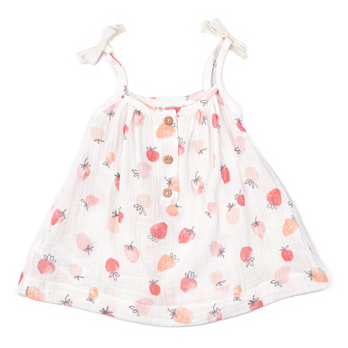 White dress with strawberry pattern on a white background