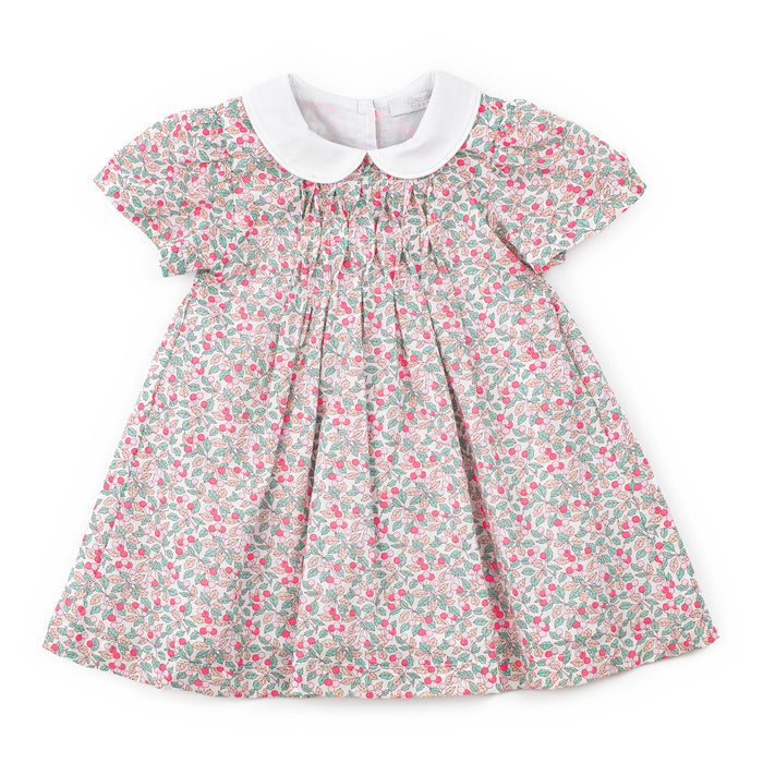 Floral dress with a white collar on a white background