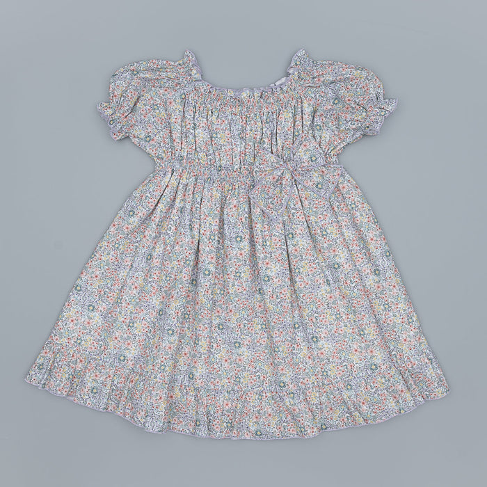 Floral dress on a gray background