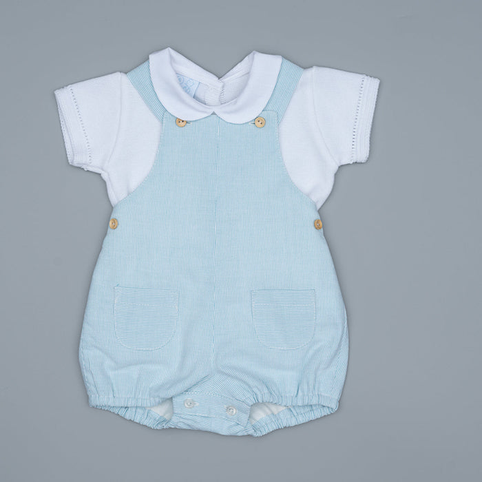 Light blue baby romper with white collar on a gray background