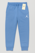 Jordan Essentials fleece pants in university blue, size 12-13, featuring a comfortable fit and Jordan branding.