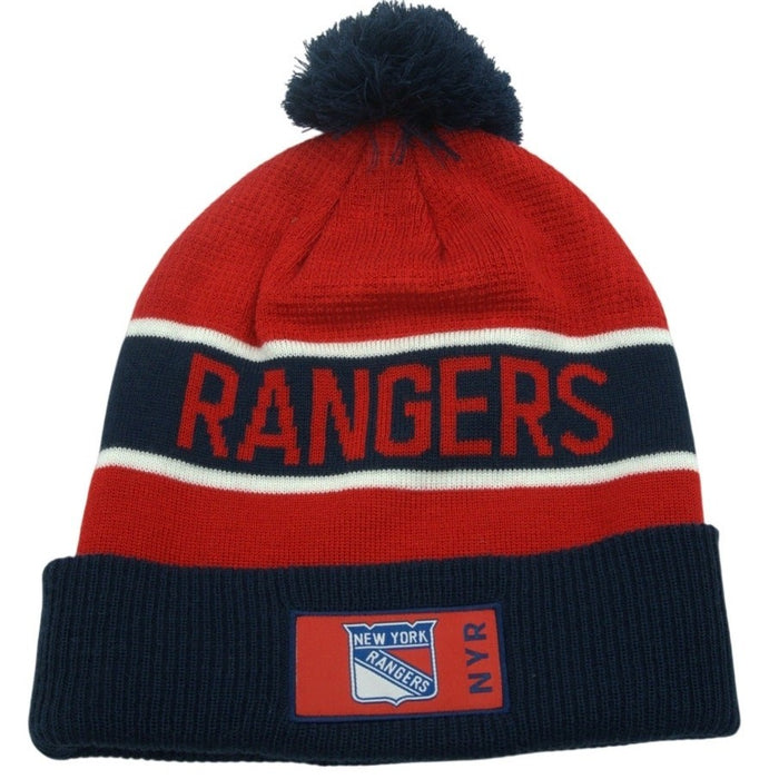 Fanatics New York Rangers pom beanie knit hat with embroidered NHL logo, featuring team colors and a cozy, casual style.