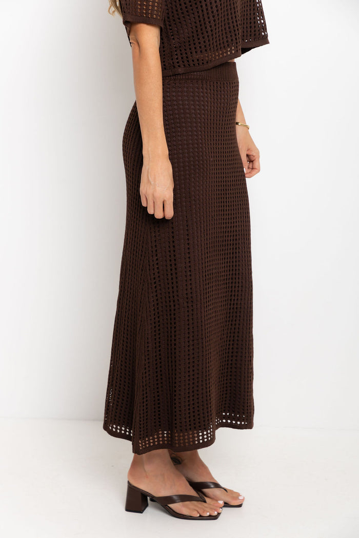 Florence crochet midi skirt in chocolate brown, open-weave knit skirt styled with matching crop top and thong sandals