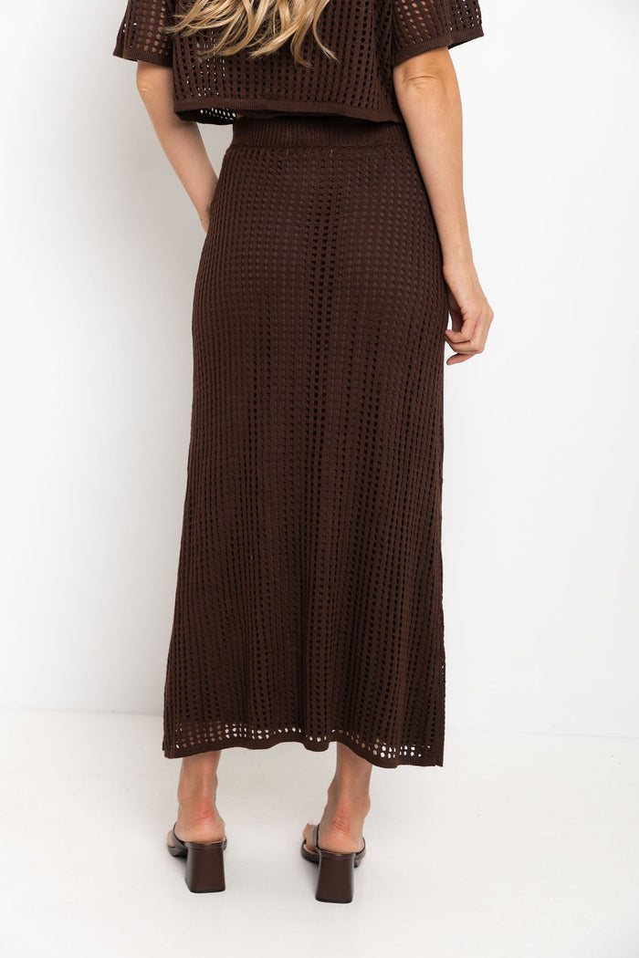 Florence crochet midi skirt in chocolate brown, open-weave knit skirt styled with matching crop top and thong sandals
