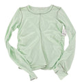 Free People Movement pistachio long sleeve T-shirt with crew neck and subtle branding, displayed flat on a white background.