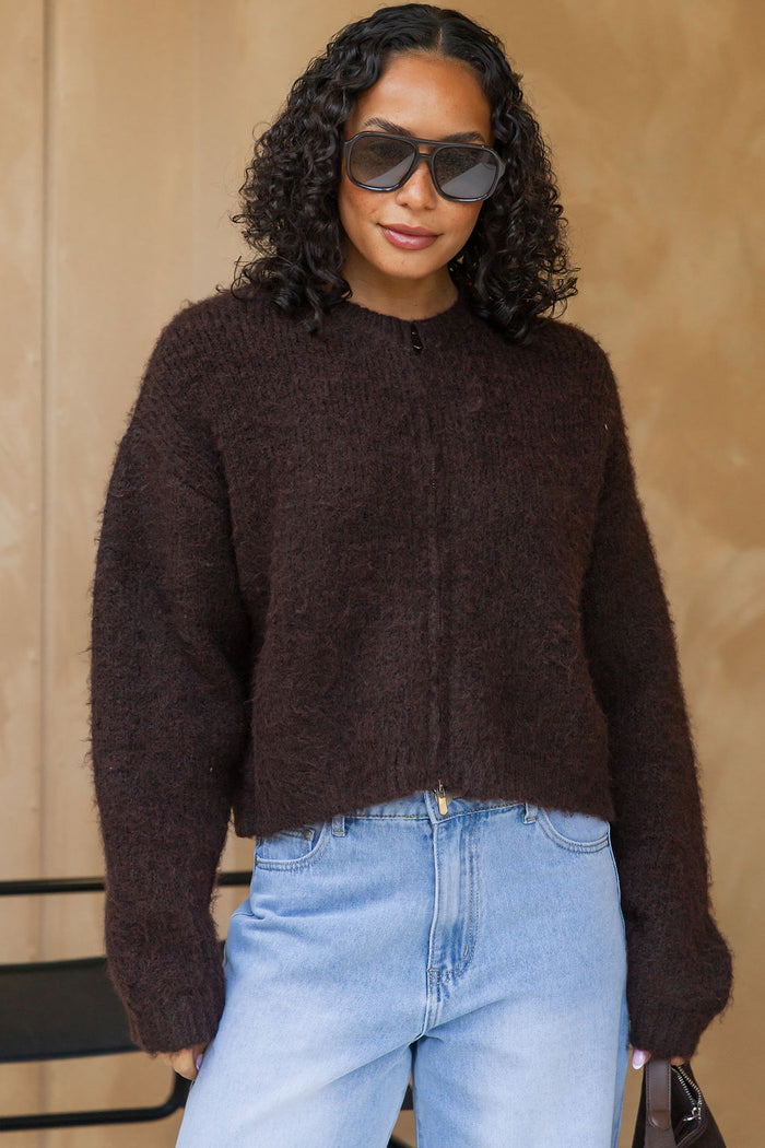 Freya Cardigan in chocolate brown, cropped fuzzy knit sweater with half-zip neckline styled with light wash denim jeans and a brown suede bag