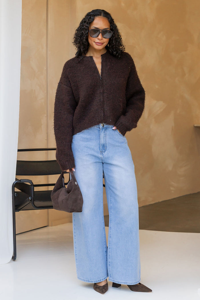 Freya Cardigan in chocolate brown, cropped fuzzy knit sweater with half-zip neckline styled with light wash denim jeans and a brown suede bag