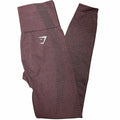 Maroon Gymshark Vital Rise leggings in small size, shown flat with a smooth, stretchy fabric and high-rise waistband.