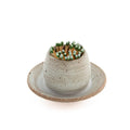 Speckled ceramic match striker hat with green matches