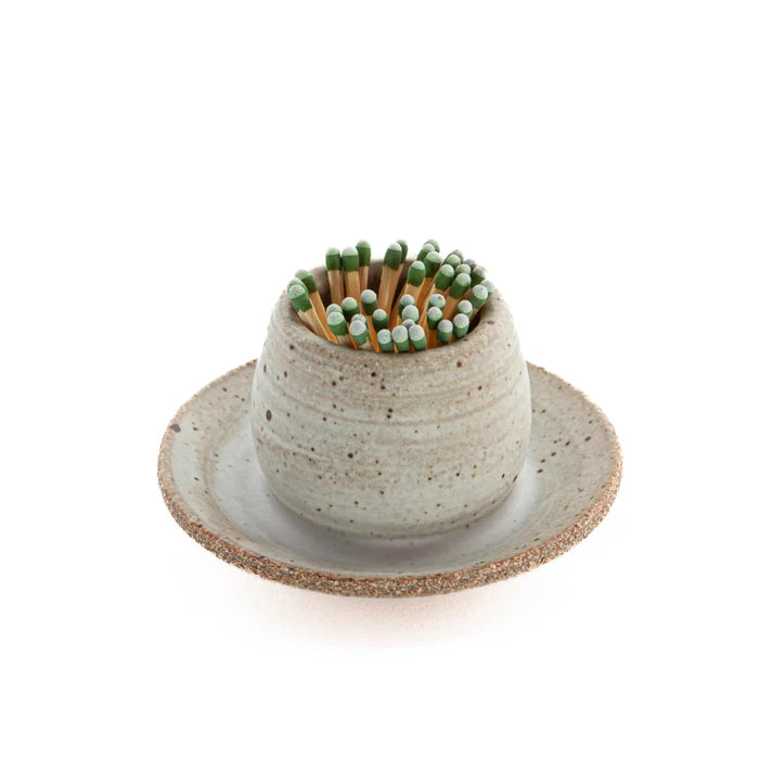 Speckled ceramic match striker hat with green matches