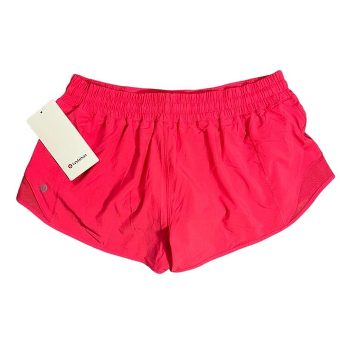 Lululemon Hotty Hot Shorts 2.5-inch in Lipgloss Pink for women, size 14, featuring lightweight athletic design and vibrant color.