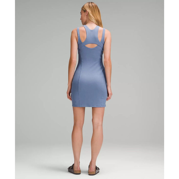 Lululemon women's ribbed cotton-modal cut-out dress in size 4, featuring a fitted silhouette with stylish cut-outs and ribbed texture.