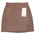 Lululemon Scuba high-rise mini skirt in brown, women's size large, shown on a model with a fitted style and soft fabric.