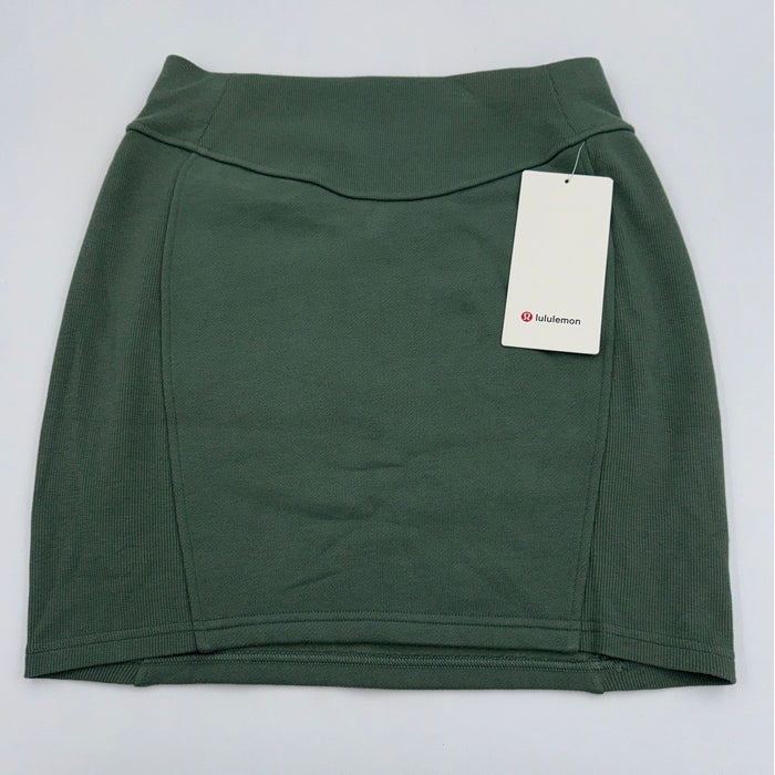 Lululemon Scuba HR Mini Skirt in high-rise stretch fabric, women's small size, displayed on a hanger with a neutral background.