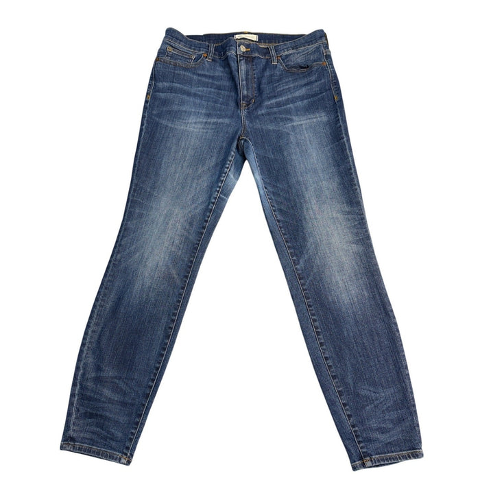 Madewell high riser skinny jeans for women in size 32, featuring a dark wash and classic five-pocket design.