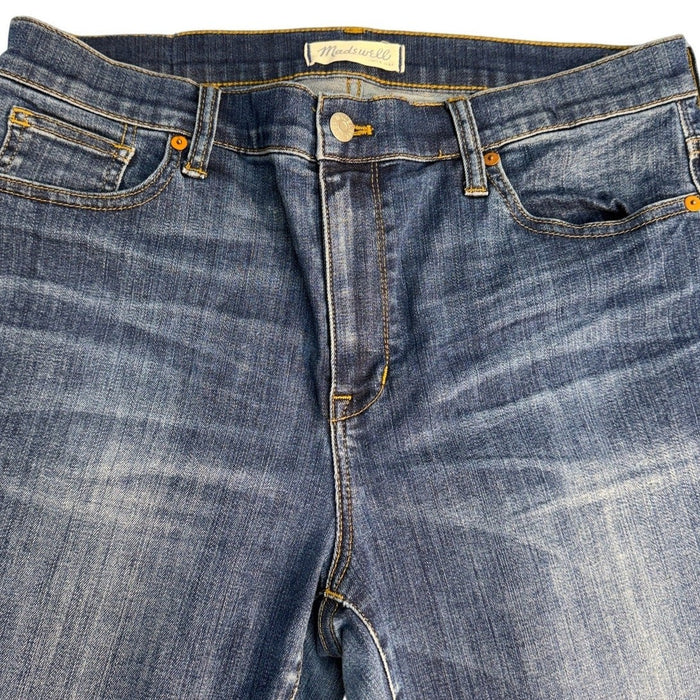 Madewell women's high riser skinny jeans in size 32, showing the fitted denim with classic five-pocket design and dark wash.