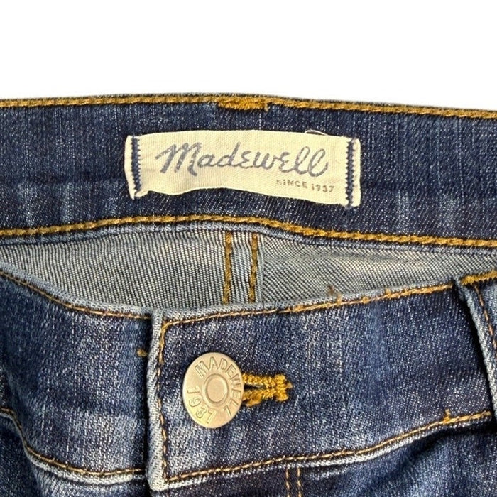Madewell high riser skinny jeans for women in size 32, featuring dark wash denim and fitted style with visible stitching and pockets.