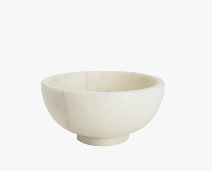 White marble bowl with smooth, light veining and wide rounded shape