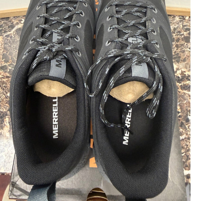 Men's Merrell Altalight Trail Hiking Shoes in black and rock color, showing the durable upper and rugged sole for outdoor hiking.
