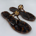 Tory Burch Mini Miller Jelly Sandals in tortoise shell, women's size 8, showcasing the stylish and transparent sandal design.