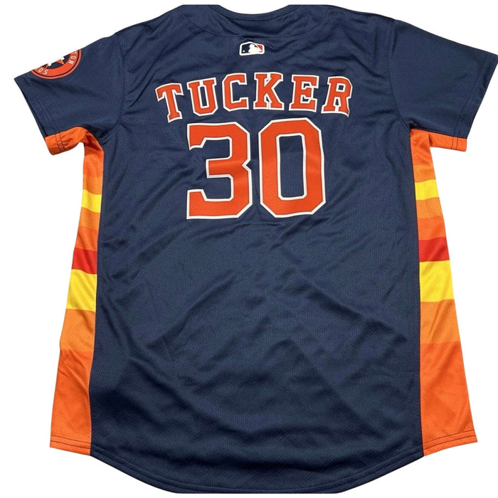 Nike Houston Astros Kyle Tucker youth MLB jersey in large size, featuring team logo and player name on the front.