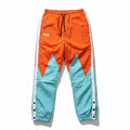 Moolah Women's Basketball Windbreaker Pants in colorblock, medium size, featuring a lightweight, sporty jacket design with wind-resistant material.