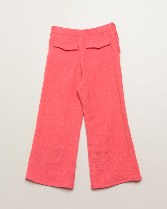 Pink pants on a light beige background