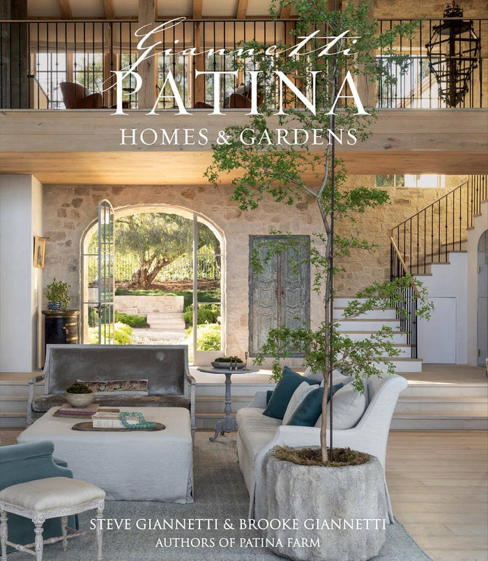 Patina Homes & Gardens book page: outdoor loggia with seating and arched doorway
