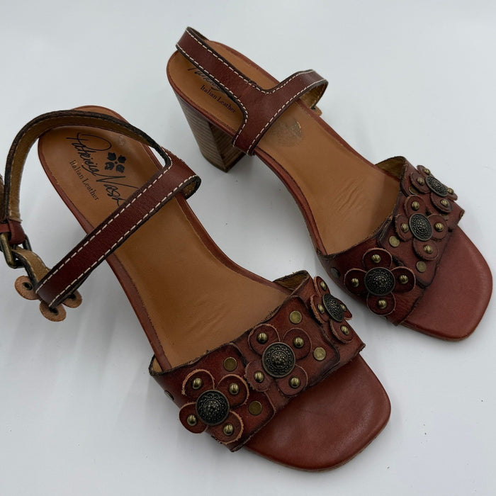 Patricia Nash brown Italian leather floral studded sandals for women, size 9.5, featuring decorative floral and studded details.