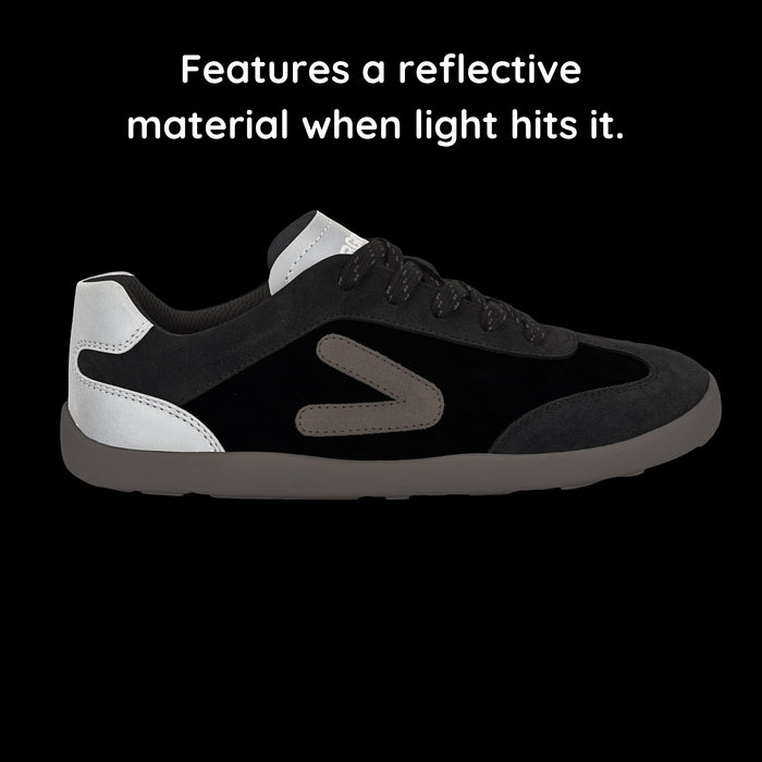 Kids Suede Trainer Black Grey in the dark showing reflective material.