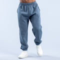 Blue graphic jogger pants with elastic waistband, tapered cuffs, and side print
