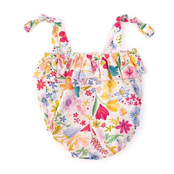 Floral-patterned baby romper with colorful flowers on a white background
