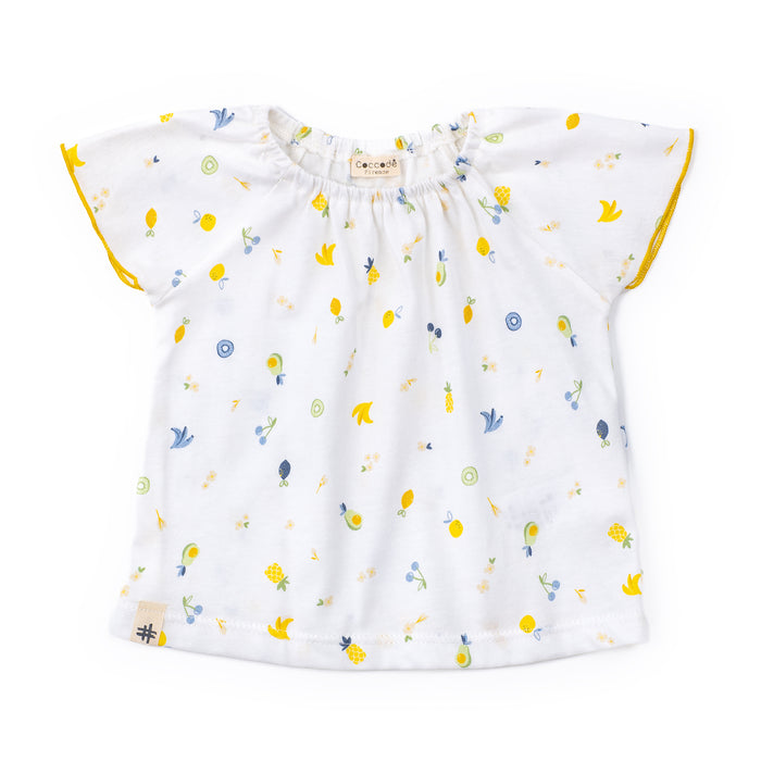 White blouse with colorful floral pattern on a white background