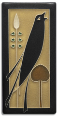 Songbird golden (facing right) by Motawi at Main Street Art.