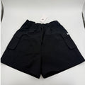 Nike Sportswear Essential women's woven high-rise shorts in medium size, featuring a comfortable fit and stylish design.